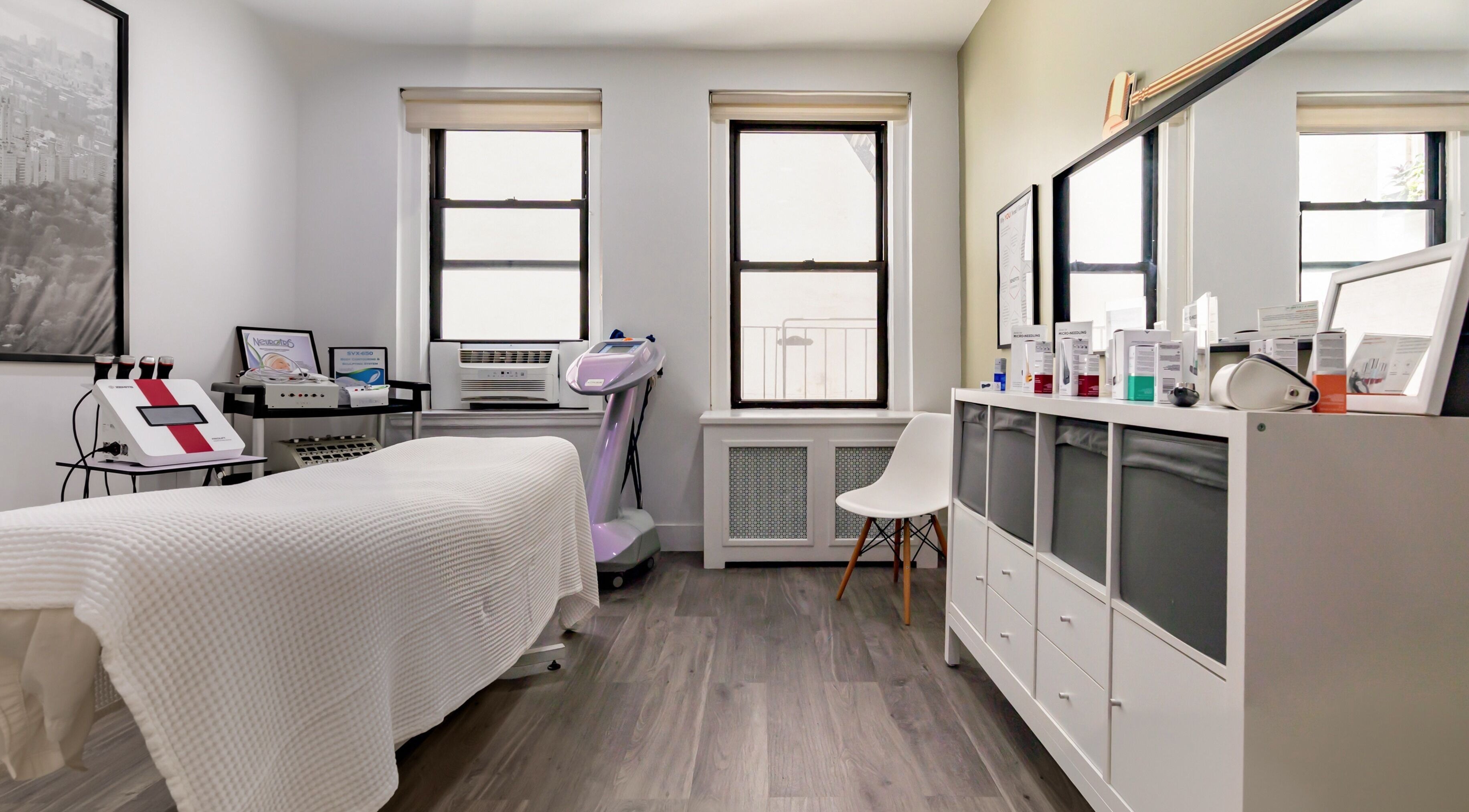 Cozy treatment room at The Renew Anti-Aging Center, New York, New York, US, with elegant decor and skincare equipment.