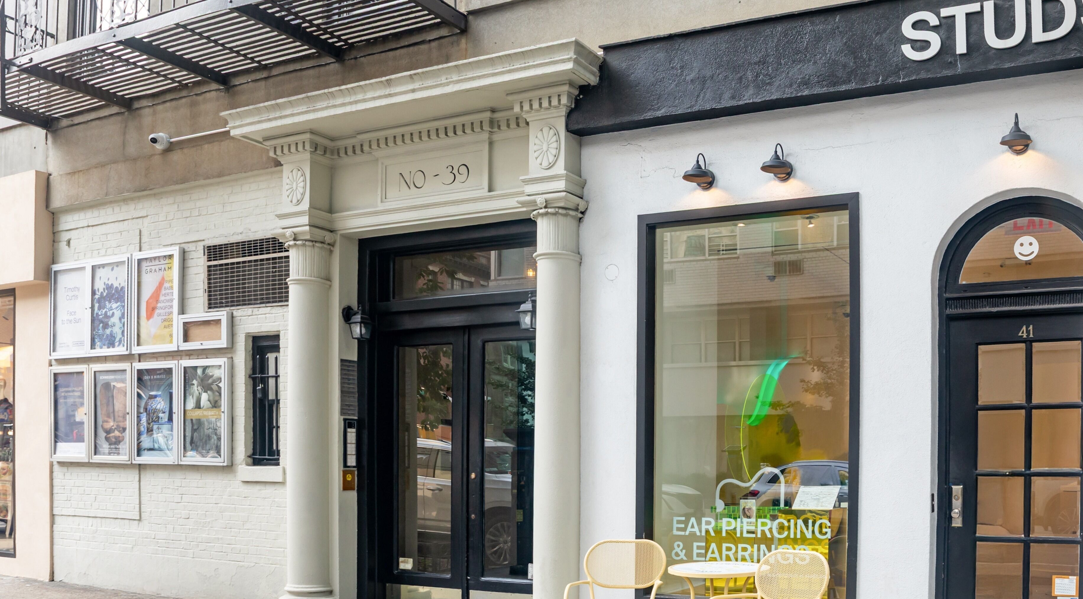 Entrance of The Renew Anti-Aging Center in New York, New York, US showcasing classic columns and modern signage.