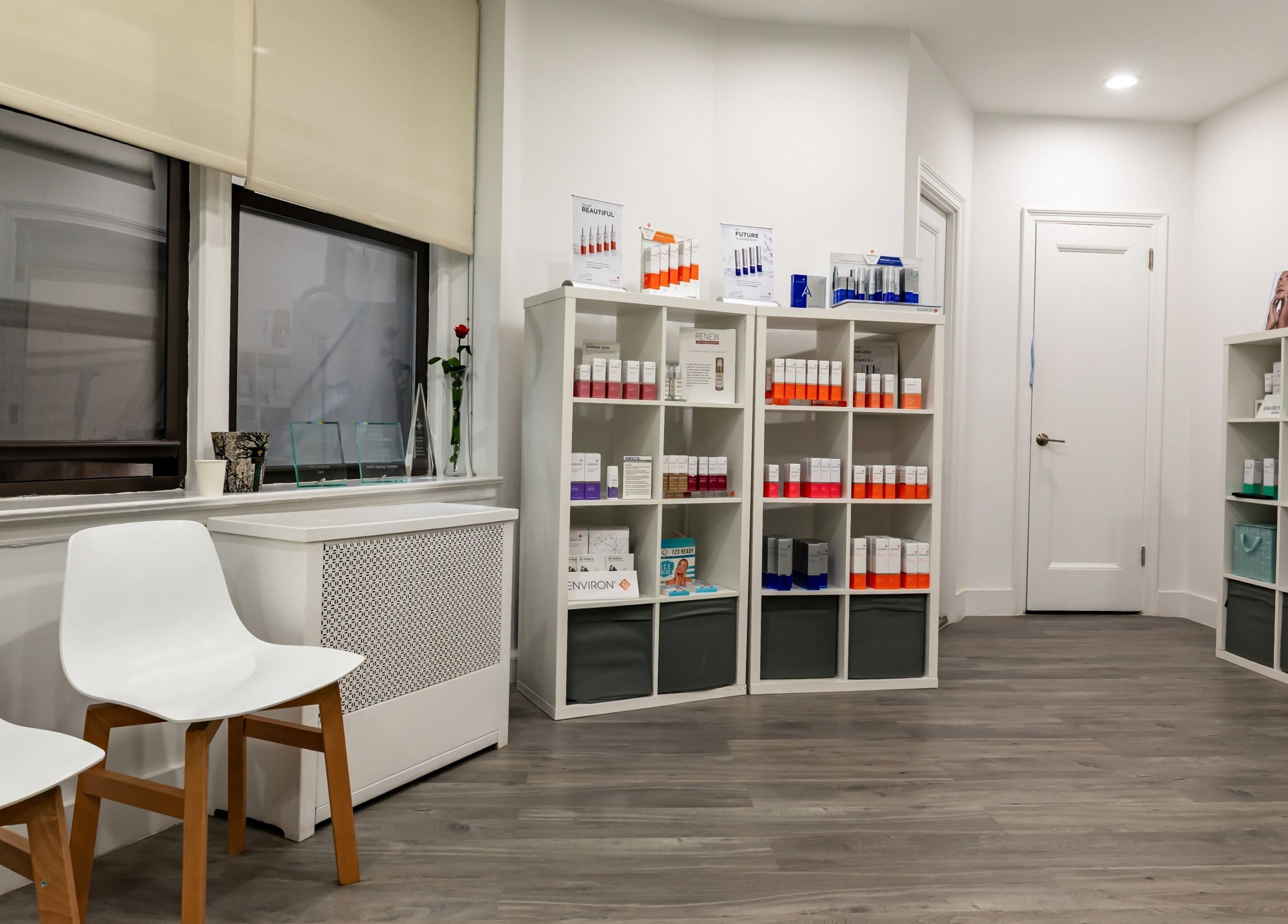 Modern and inviting interior of The Renew Anti-Aging Center in New York, New York, US featuring product displays.