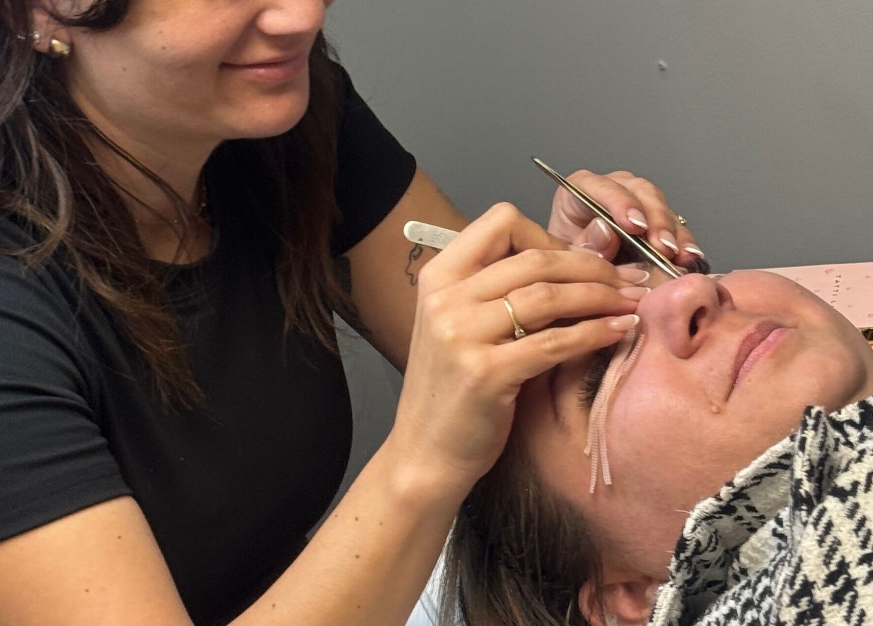 Professional eyelash treatment at Blush Beauty Studio, Henfield, England, GB, ensuring precise lash application.