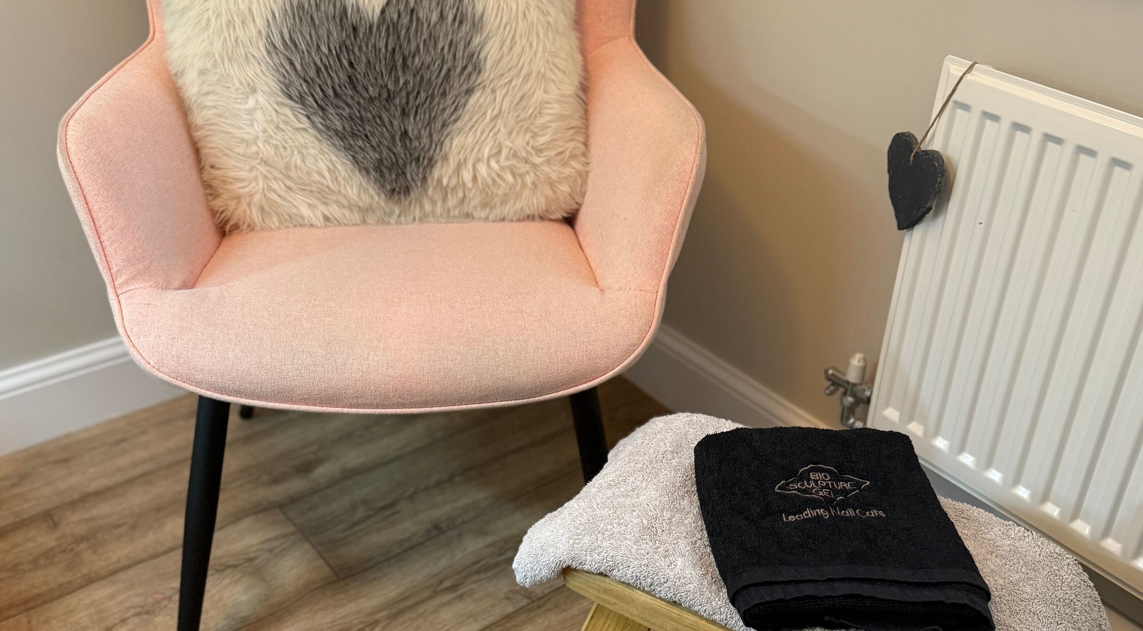Comfortable pink chair and luxurious towel set at Nails by Tasha, North Hykeham, England, GB.