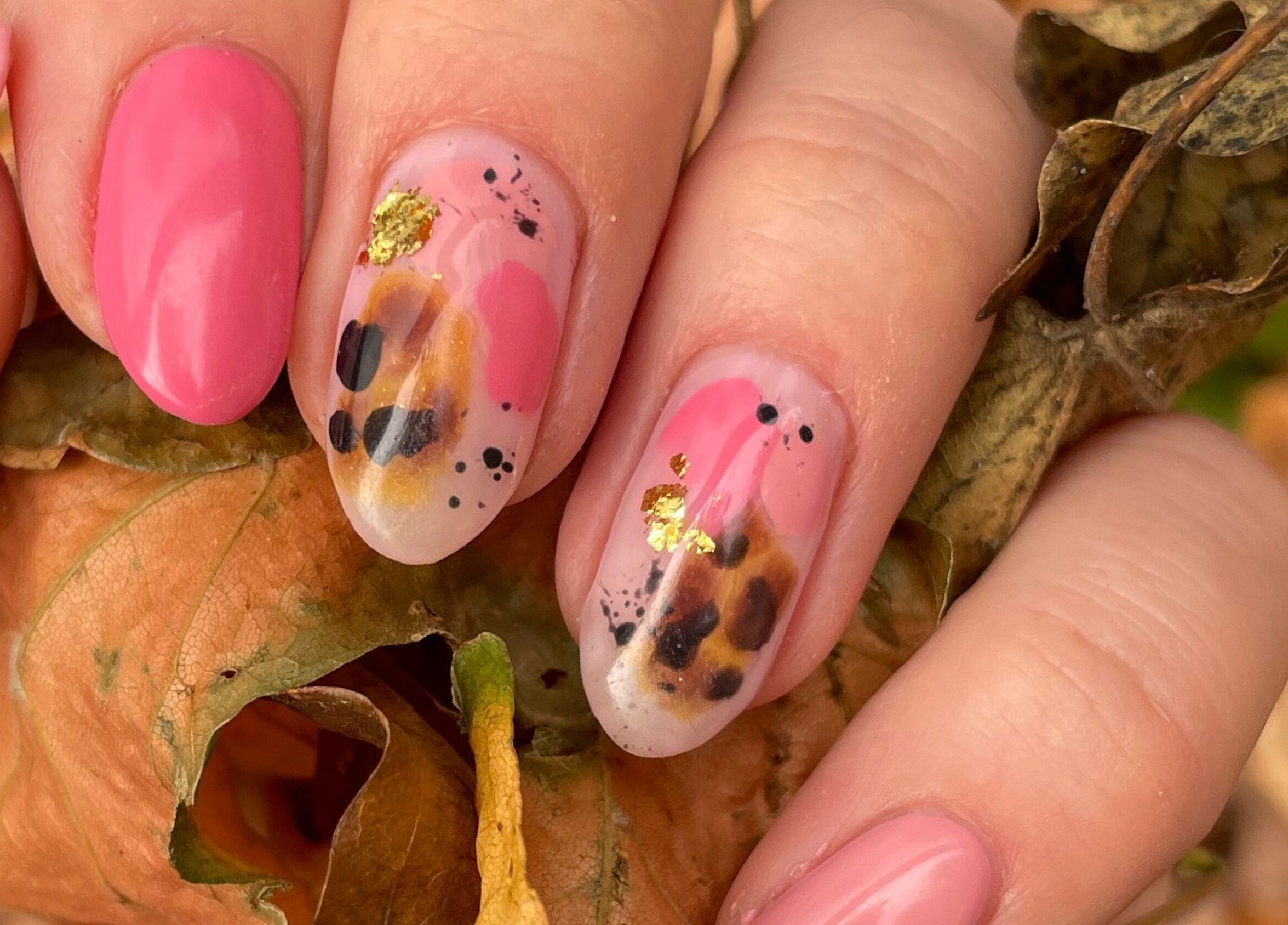 Elegant autumn nail art with pink and abstract designs by Nails by Tasha, North Hykeham, England, GB.