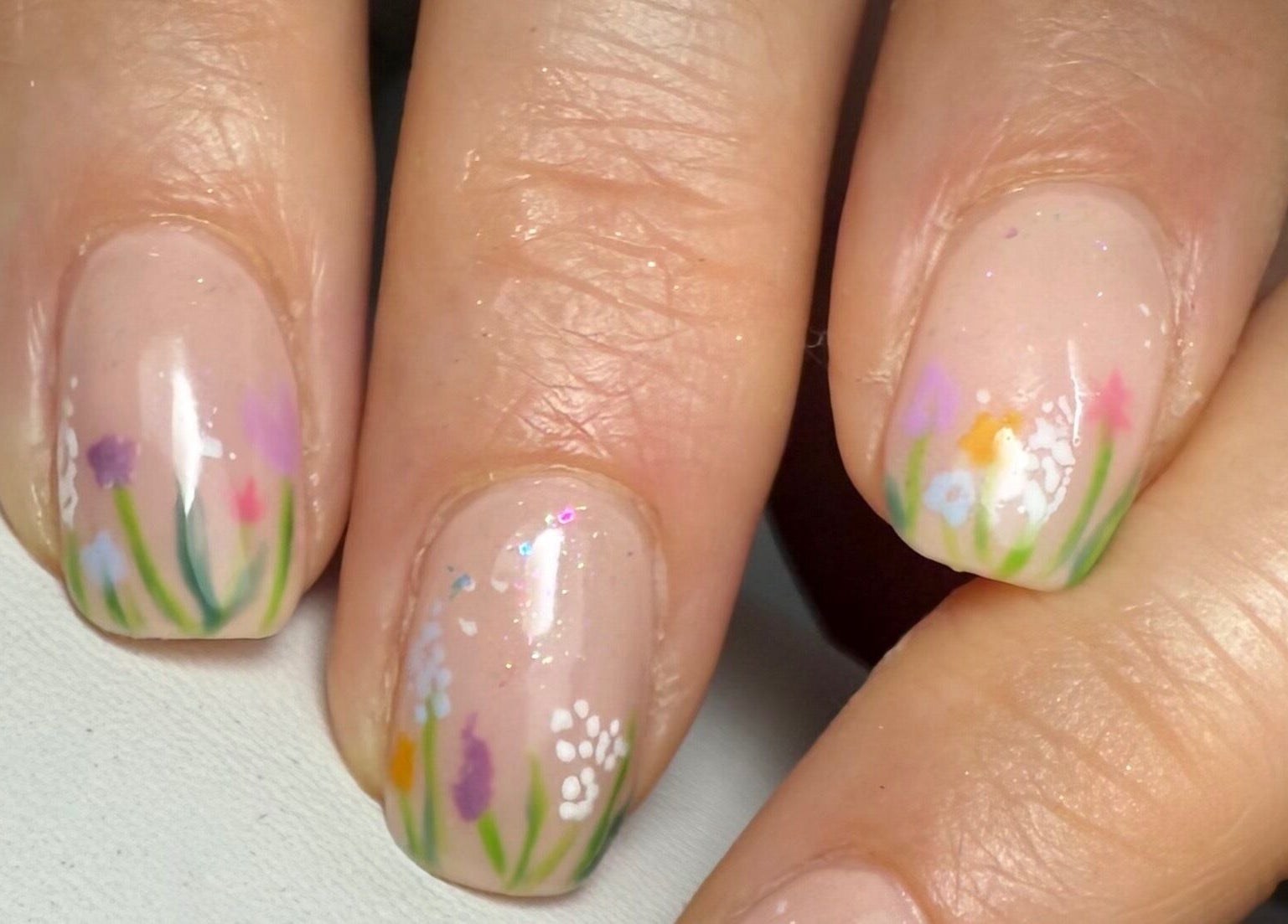 Elegant floral nail art featured at Nails by Tasha in North Hykeham, England, GB.