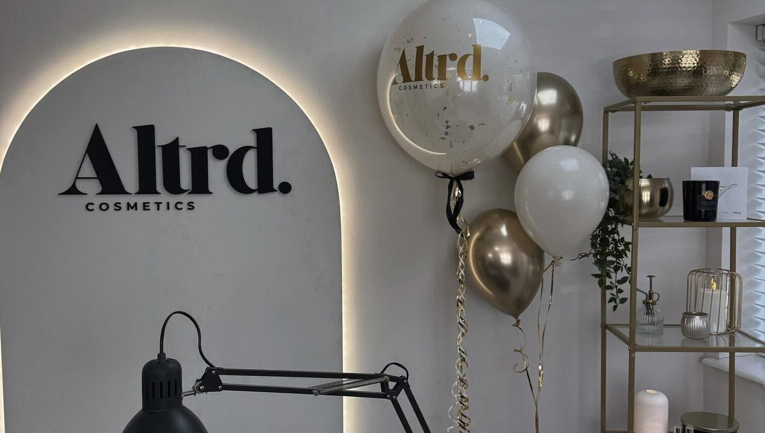 Modern interior of Altrd. Cosmetics in Huntington, England, GB with stylish decor and branded balloons.