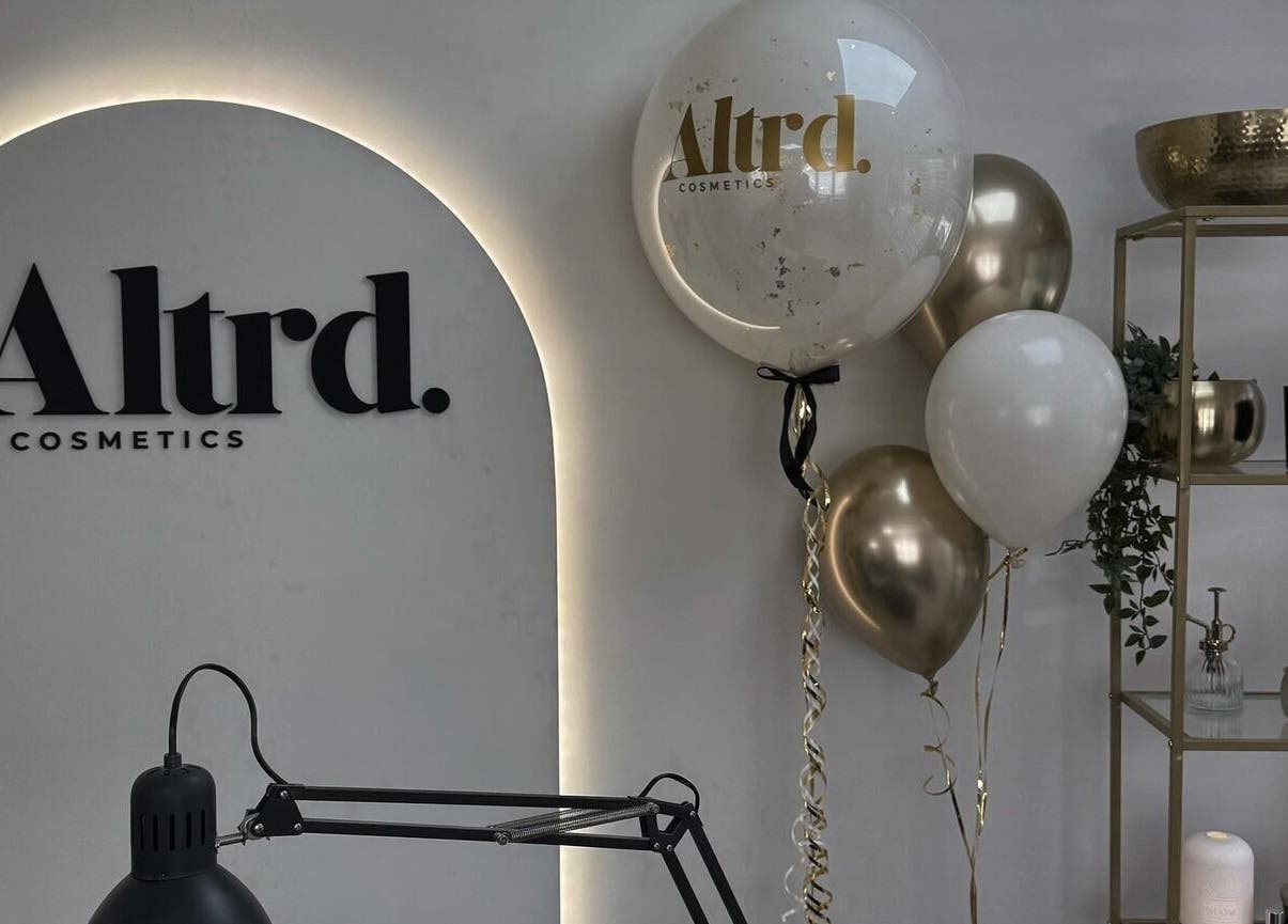 Modern interior of Altrd. Cosmetics in Huntington, England, GB with stylish decor and branded balloons.