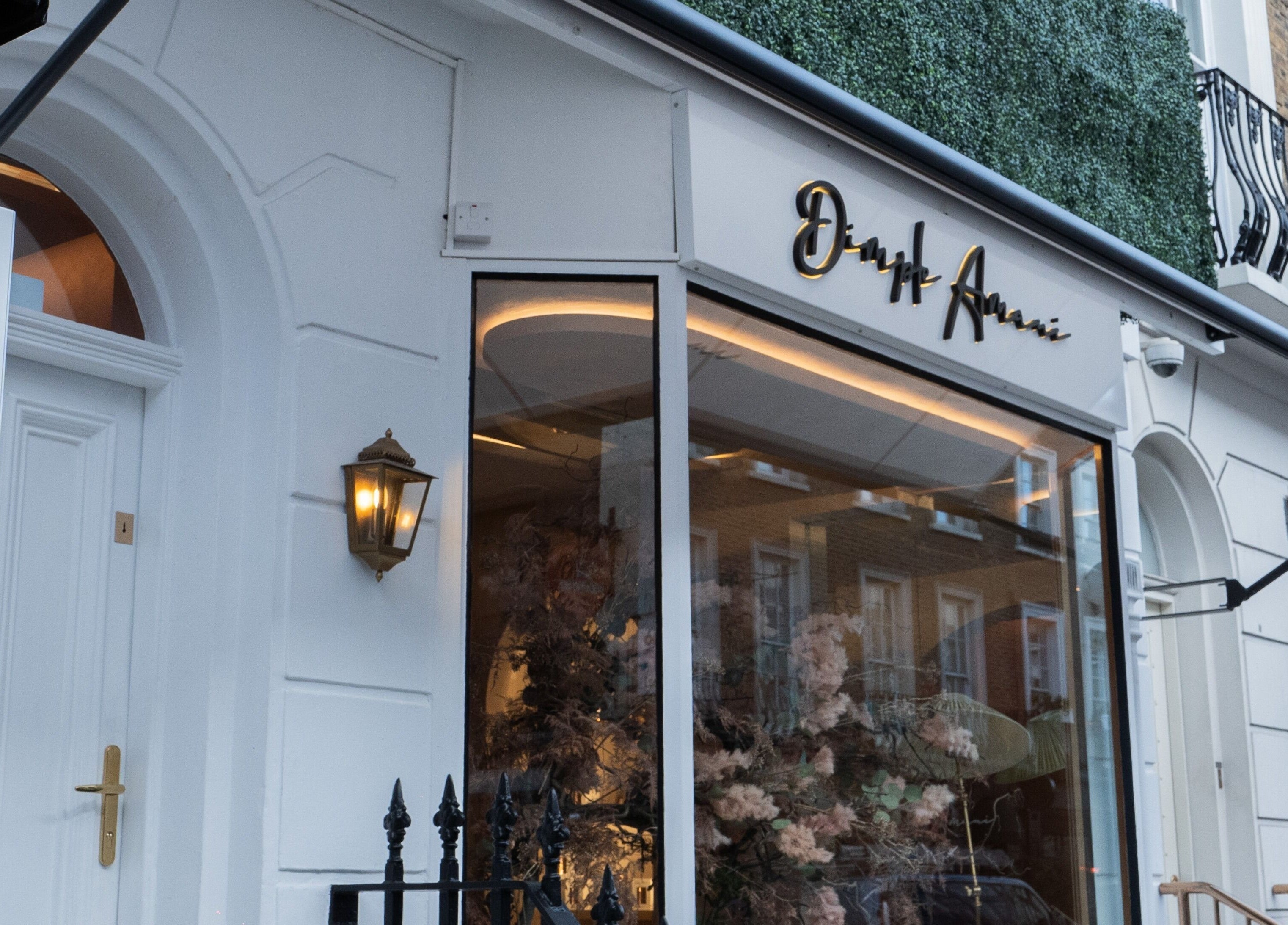 Elegant entrance of Dimple Amani Knightsbridge in London, England, GB showcasing stylish decor.