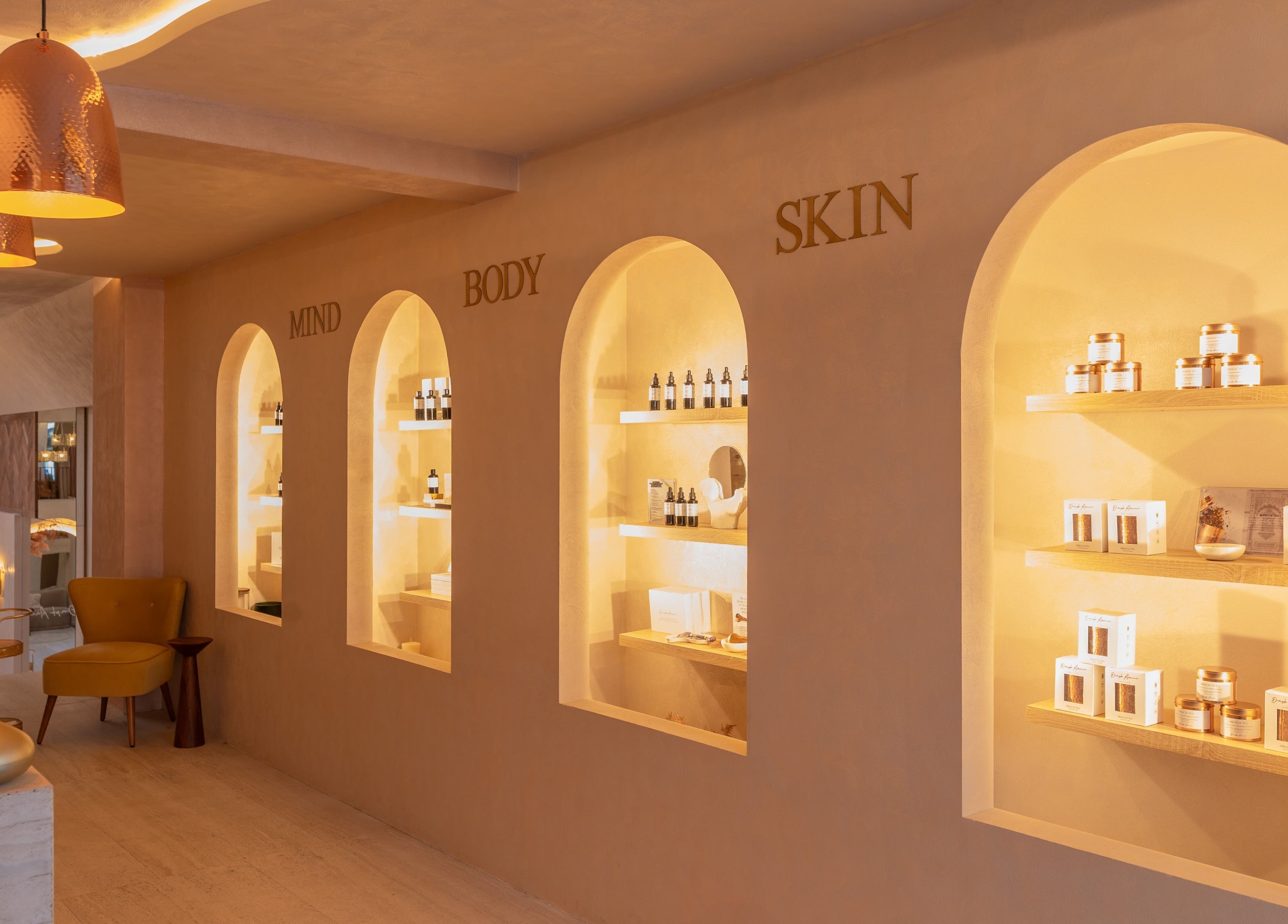 Elegant shelves with wellness products at Dimple Amani Knightsbridge, London, England, GB.