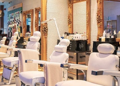 Luxury salon chairs and ornate mirrors at Mayfair Aesthetics and Beauty, London, England, GB.
