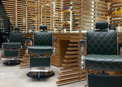 Luxurious barber chairs at The Good Barbers - Enge in Zürich, Zürich, CH, await customers in a modern setting.