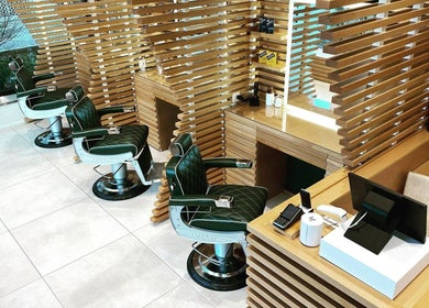 Luxurious barber chairs at The Good Barbers - Enge, Zürich, Zürich, CH, offering top-notch grooming experience.