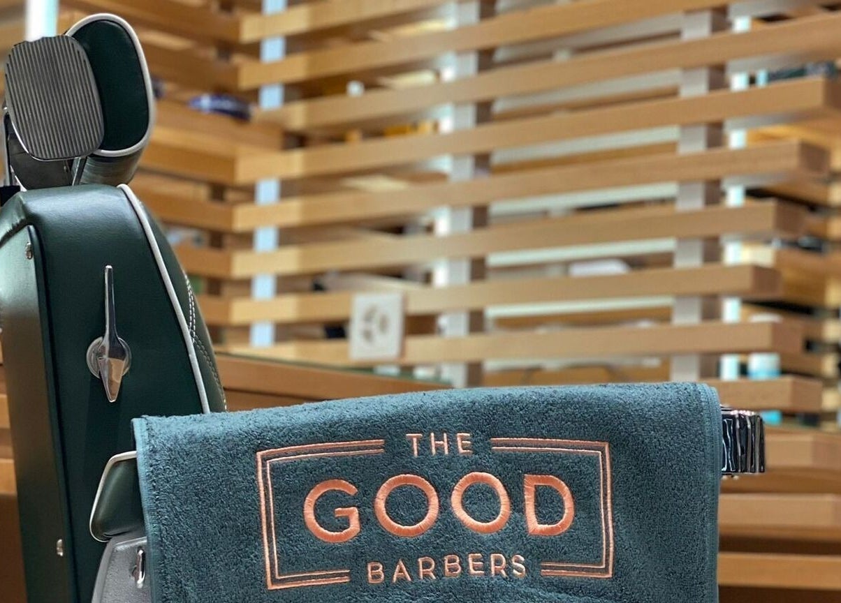 Elegant barber chair at The Good Barbers - Enge, Zürich, Zürich, CH with branded towel.