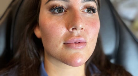 Close-up of a woman's glowing skin after a facial at Mediskin - Liverpool in Prescot, England, GB.