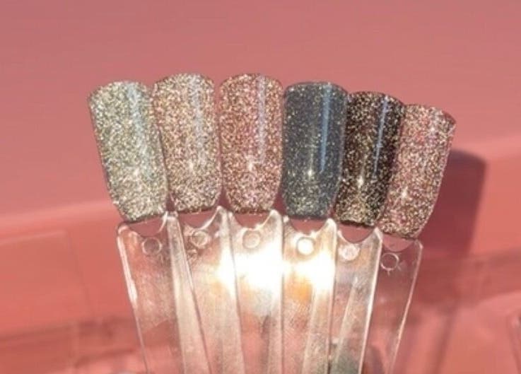 Glitter nail polish swatches at House of Rome, Beckingham, England, GB, showcasing variety for stylish nails.
