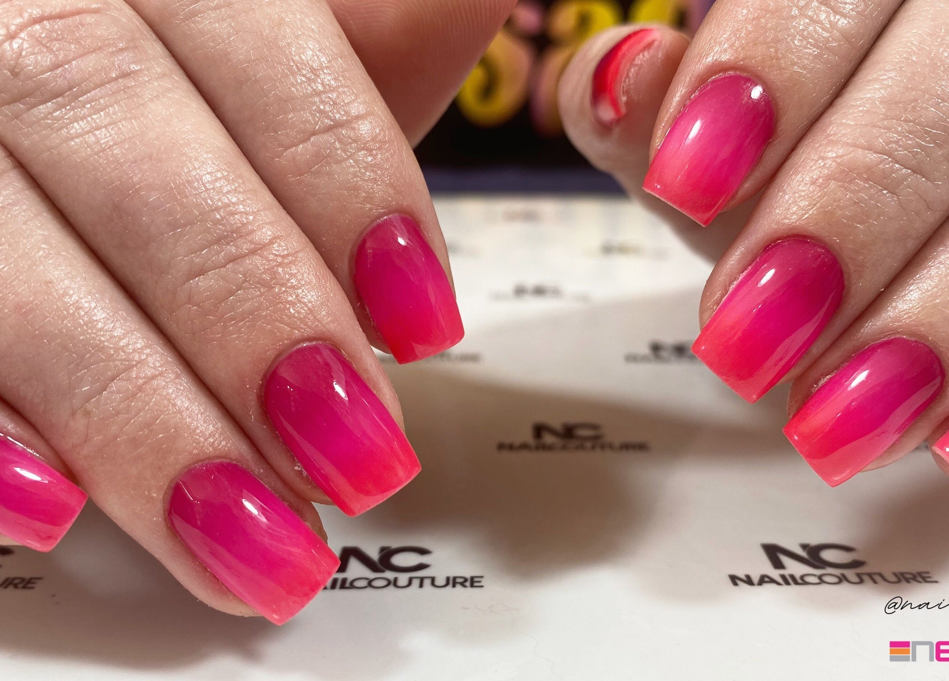 Close-up of vibrant pink ombre nails at Nails By Dom, Benoni, Gauteng, ZA.