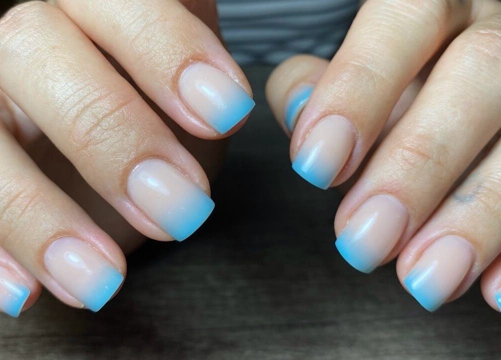 Elegant blue ombre nails at Nails By Dom, Benoni, Gauteng, ZA, showcasing chic manicure style.
