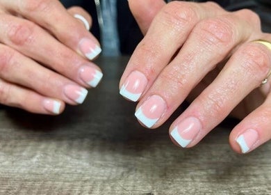 French manicure showcasing elegance at Nails By Dom, Benoni, Gauteng, ZA. Perfect for a chic, polished look.