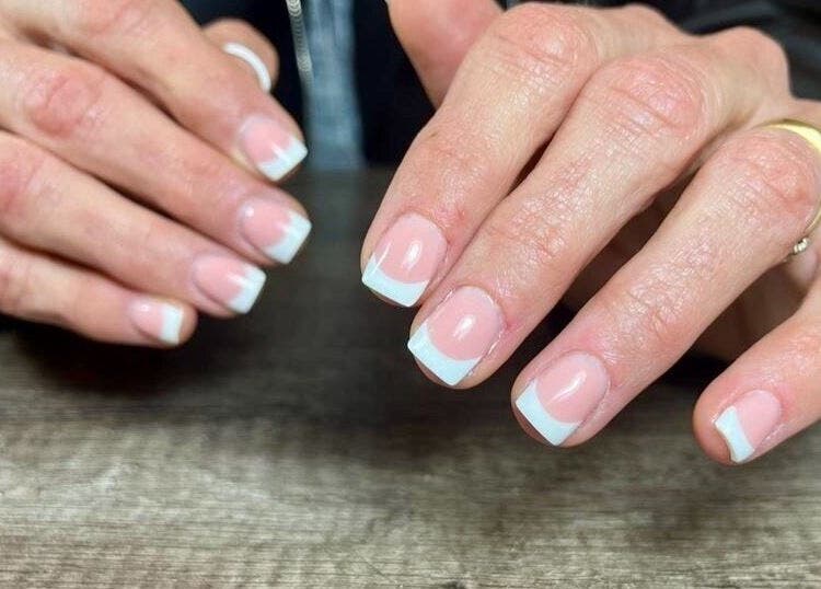French manicure showcasing elegance at Nails By Dom, Benoni, Gauteng, ZA. Perfect for a chic, polished look.