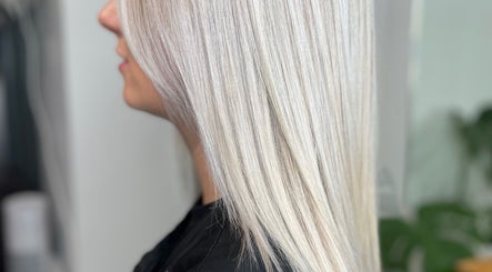 Blonde hair styled straight at Eilidh Jones Hair, Golspie, Scotland, GB. Showcasing sleek, shiny salon results.