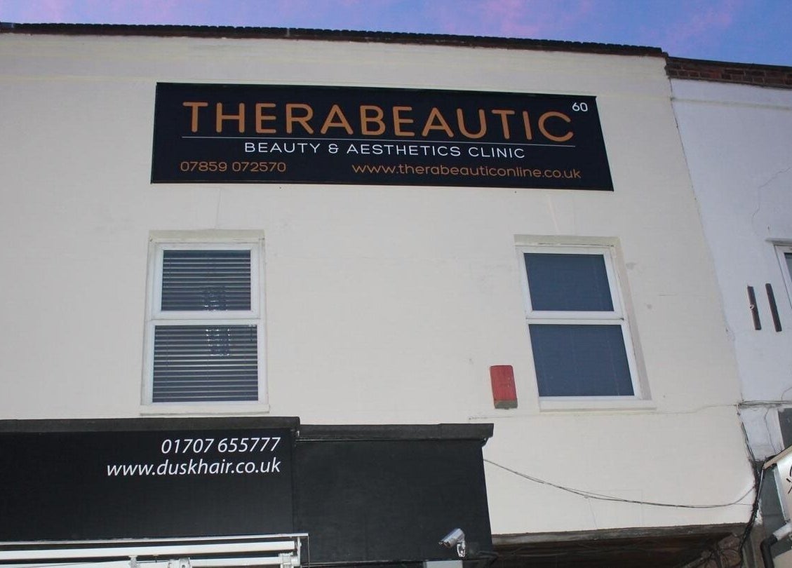 Exterior view of Therabeautic in Potters Bar, England, highlighting beauty and aesthetics clinic signage.