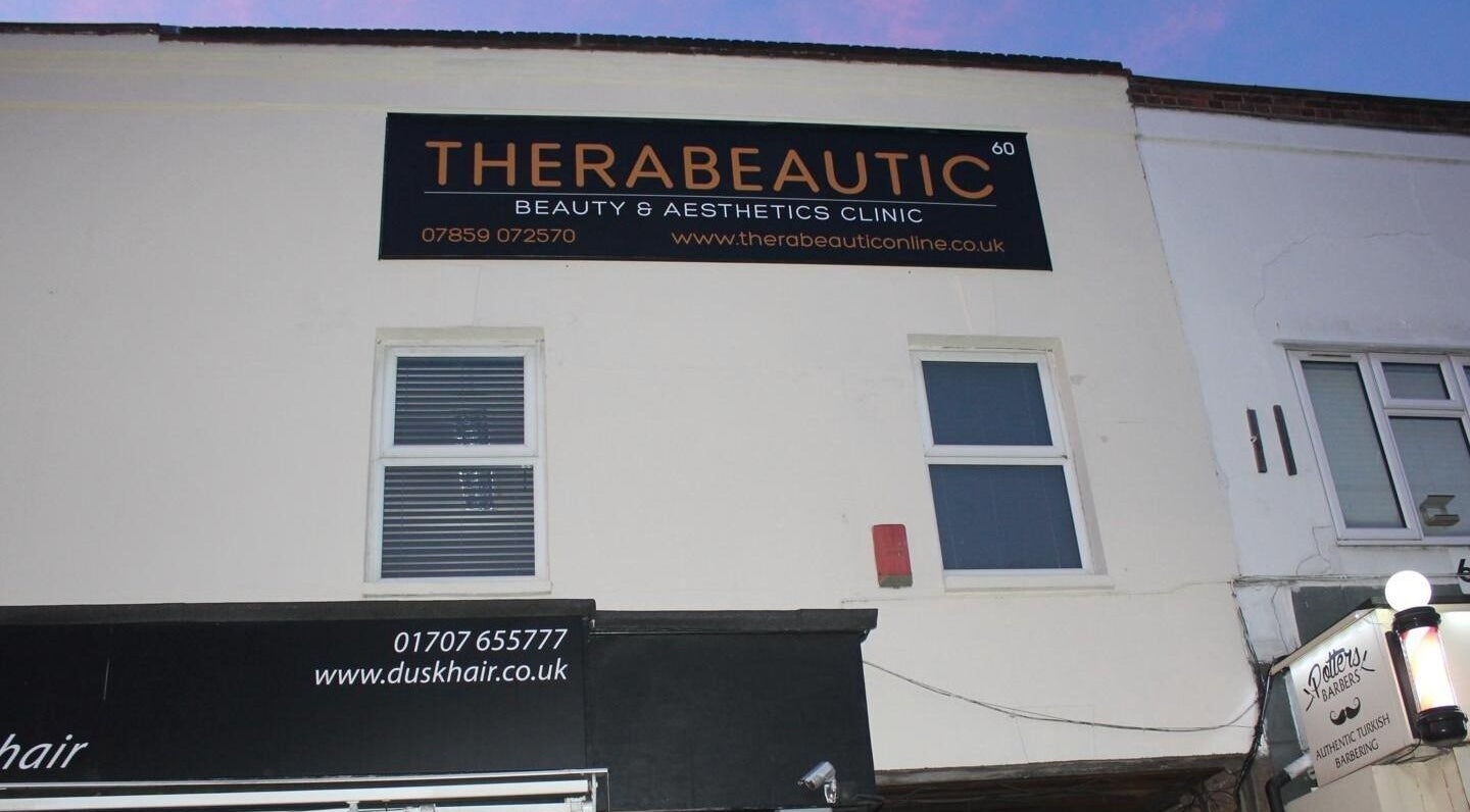 Exterior view of Therabeautic in Potters Bar, England, highlighting beauty and aesthetics clinic signage.