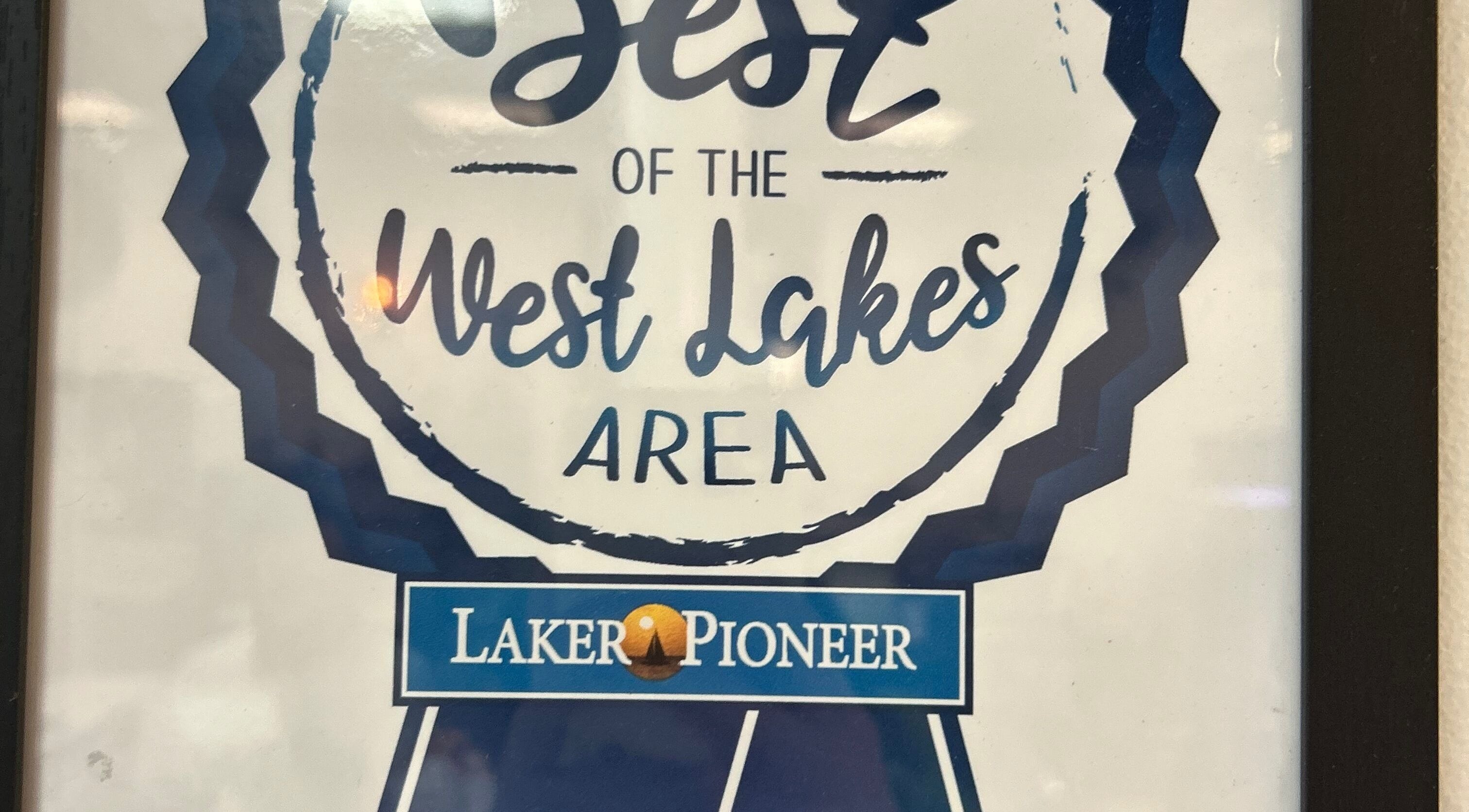 Award certificate from Laker Pioneer displayed at Pro Nails Mound, Mound, Minnesota, US.