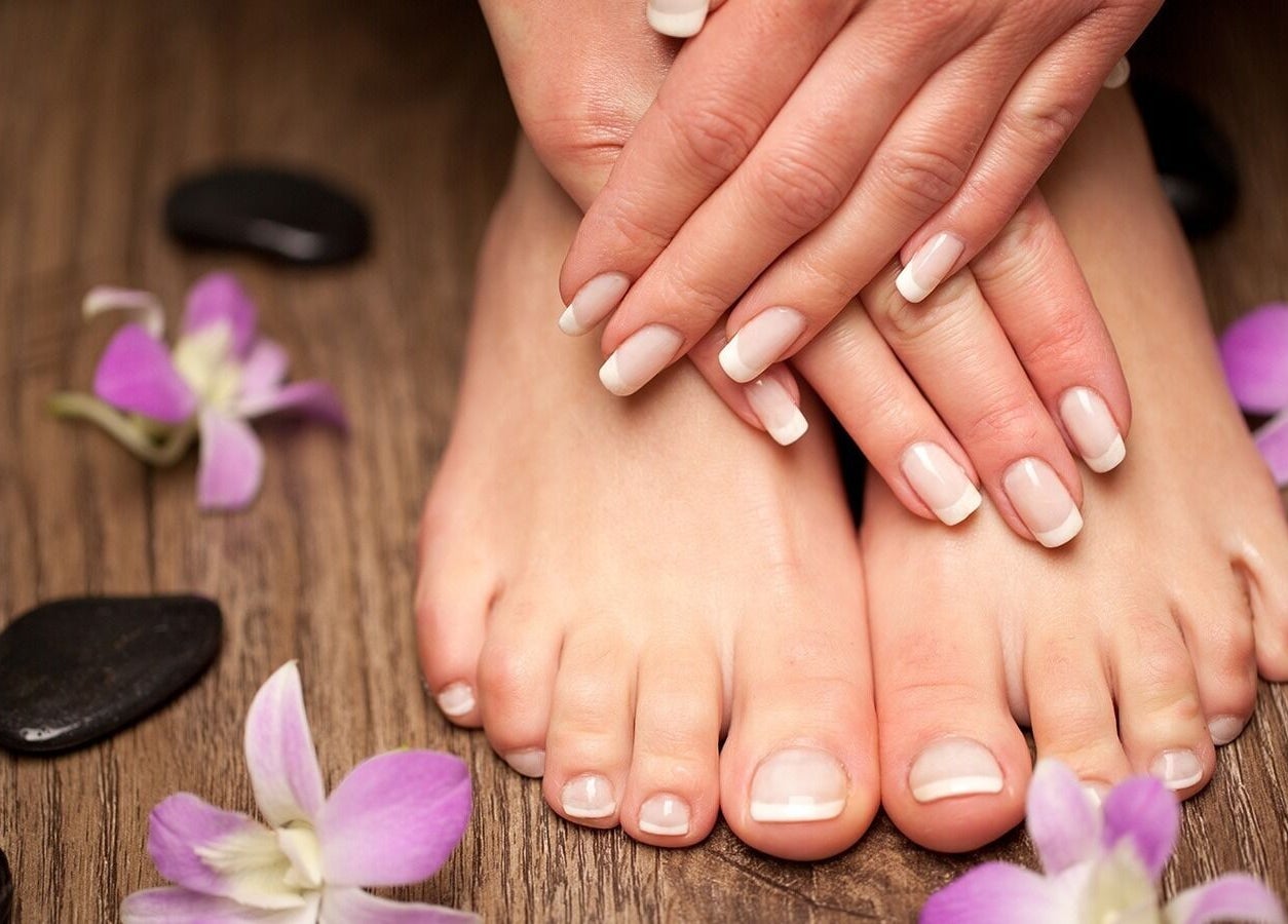 Elegant manicure and pedicure with flowers at Pro Nails Mound, Mound, Minnesota, US, enhancing relaxation.