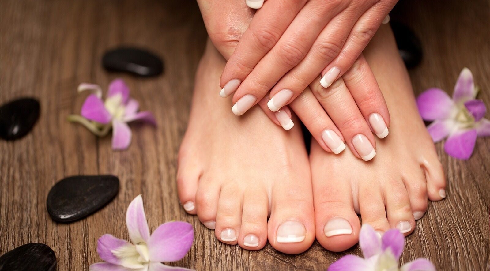 Elegant manicure and pedicure with flowers at Pro Nails Mound, Mound, Minnesota, US, enhancing relaxation.