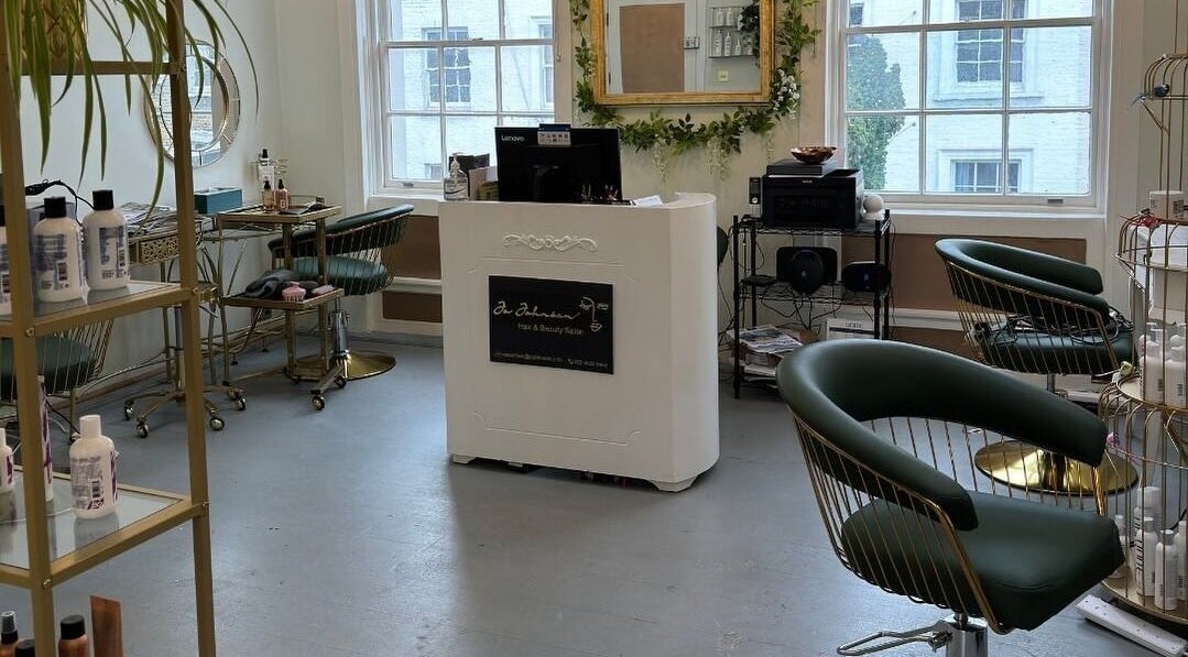 Jo Johnson Salon in London, England, GB offers a chic, inviting space with modern decor and comfortable seating.