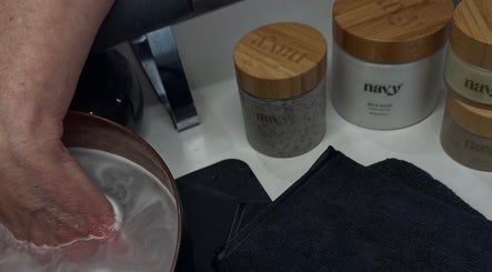 Hand soaking in a luxurious spa treatment at Toni Louise Beauty, Llanfairpwllgwyngyll, Wales, GB.