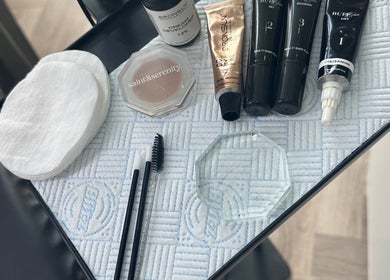 Beauty essentials at Toni Louise Beauty, Llanfairpwllgwyngyll, Wales, GB, featuring products and brushes.