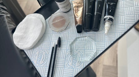 Beauty essentials at Toni Louise Beauty, Llanfairpwllgwyngyll, Wales, GB, featuring products and brushes.