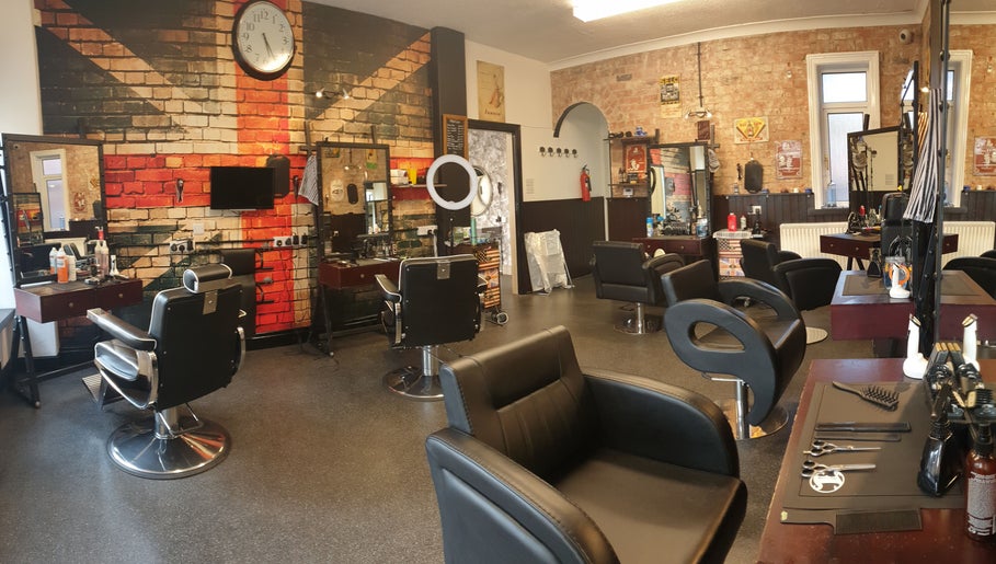 Modern hair salon at Sweeneys Catterick, Catterick Garrison, England, GB featuring stylish chairs and decor.