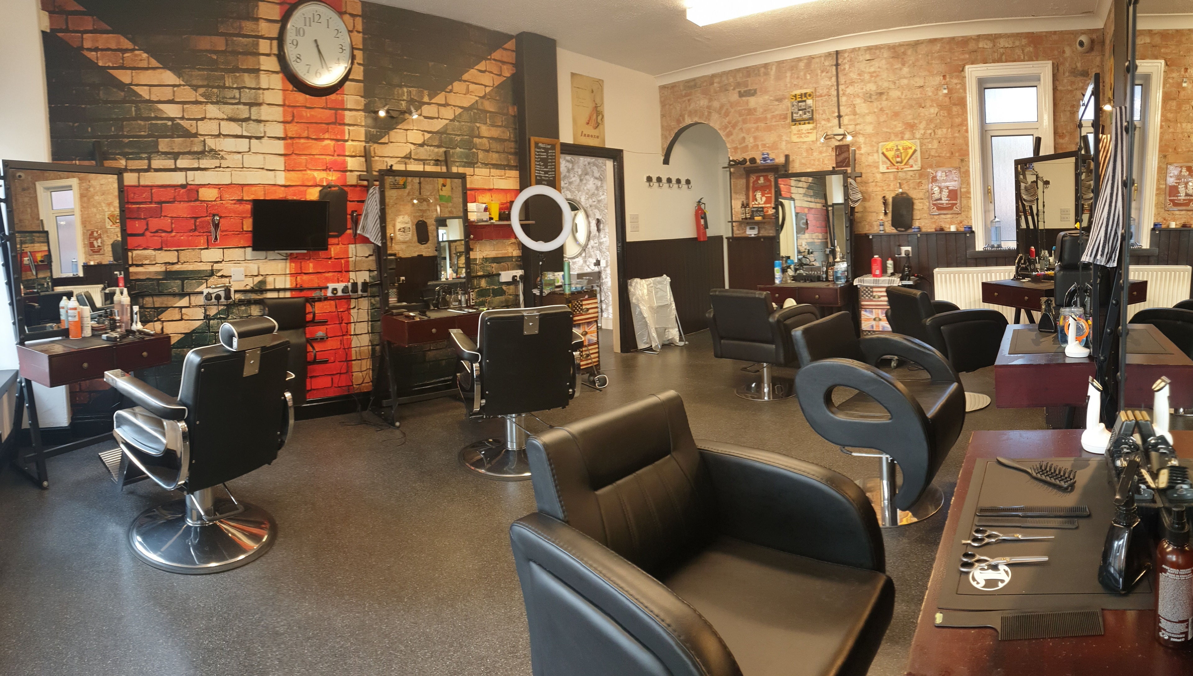 Modern hair salon at Sweeneys Catterick, Catterick Garrison, England, GB featuring stylish chairs and decor.
