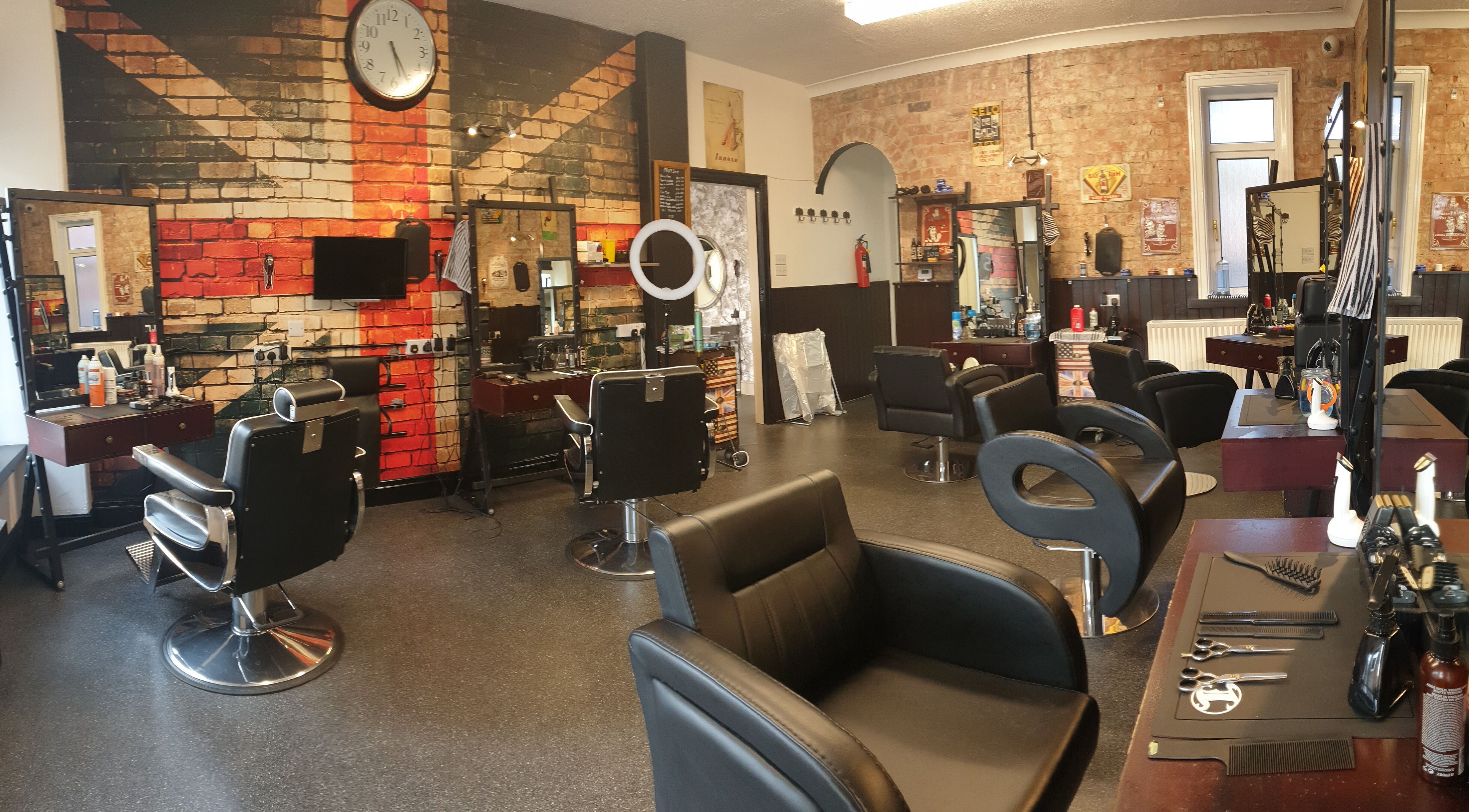 Modern hair salon at Sweeneys Catterick, Catterick Garrison, England, GB featuring stylish chairs and decor.