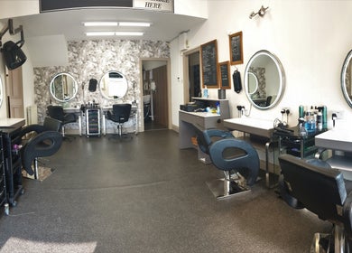 Modern salon chairs and mirrors at Sweeneys Catterick, Catterick Garrison, England, GB.