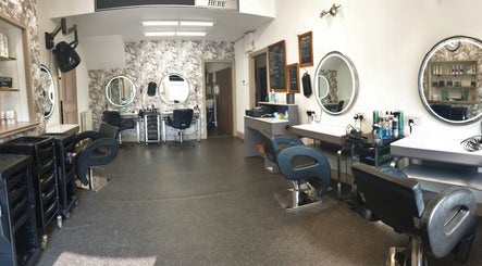 Modern salon chairs and mirrors at Sweeneys Catterick, Catterick Garrison, England, GB.