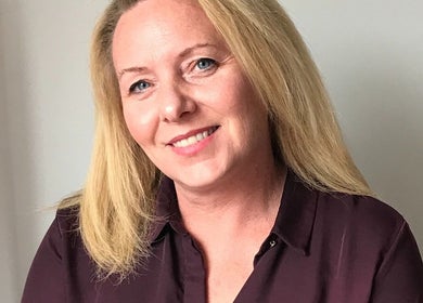 Friendly acupuncturist at Bespoke Acupuncture Upper Street, London, England, GB, ready to welcome clients.