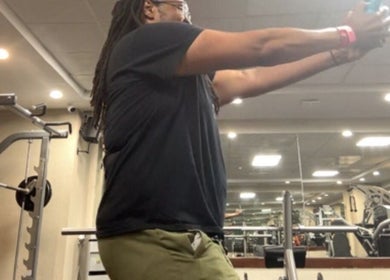 Person working out at MarkSpeakForm gym in Howell, Michigan, US surrounded by exercise equipment.