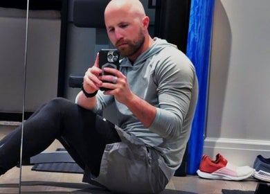 A person taking a selfie in a gym setting at Marks Peak Form in Howell, Michigan, US.