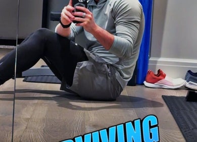 A person exercising in a gym at Marks Peak Form in Howell, Michigan, US, with workout gear visible.