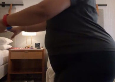 Comfortable hotel room at Marks Peak Form in Howell, Michigan, US, featuring a cozy bed and ambient lighting.