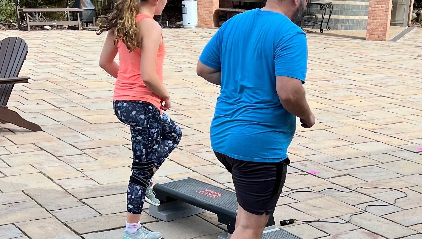 People exercising on steps at Marks Peak Form, Howell, Michigan, US, enhancing wellness routines.