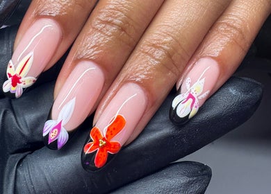 Intricate floral nail art at Lani Nails London, showcasing vibrant designs. Location: London, GB.
