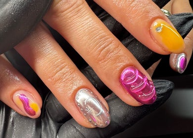 Stylish nail art with vibrant colors at Lani Nails London, London, GB showcasing modern manicure designs.