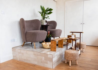 Elegant pedicure area at Lani Nails London with plush chairs and decor. London, GB.