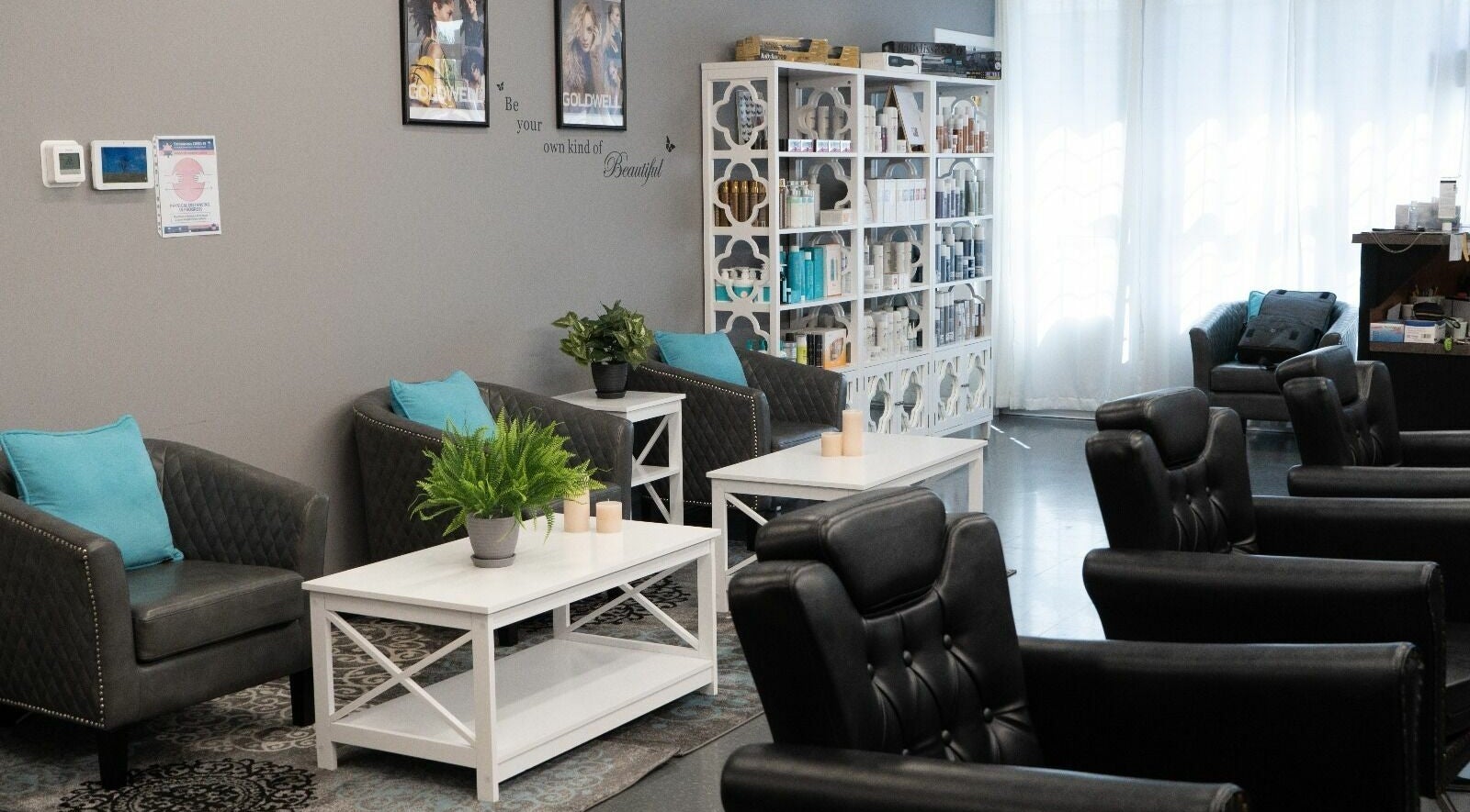 Stylin' Confidence Beauty Salon's chic interior in Surrey, British Columbia, CA, with plush seating and decor.