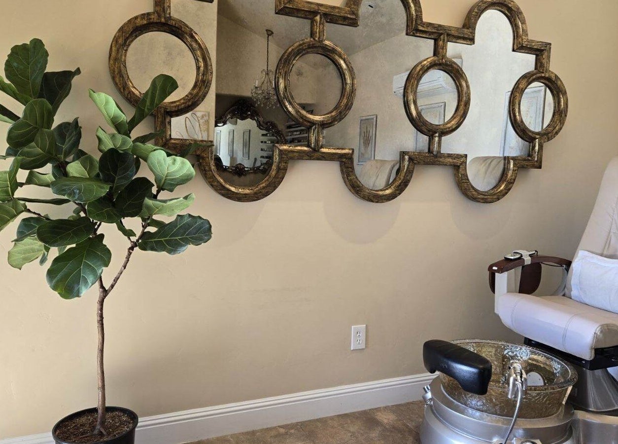 Cozy pedicure chair and elegant mirror at Opal Spa and Boutique, Santa Cruz, California, US.