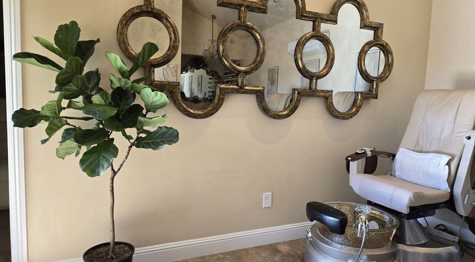 Cozy pedicure chair and elegant mirror at Opal Spa and Boutique, Santa Cruz, California, US.