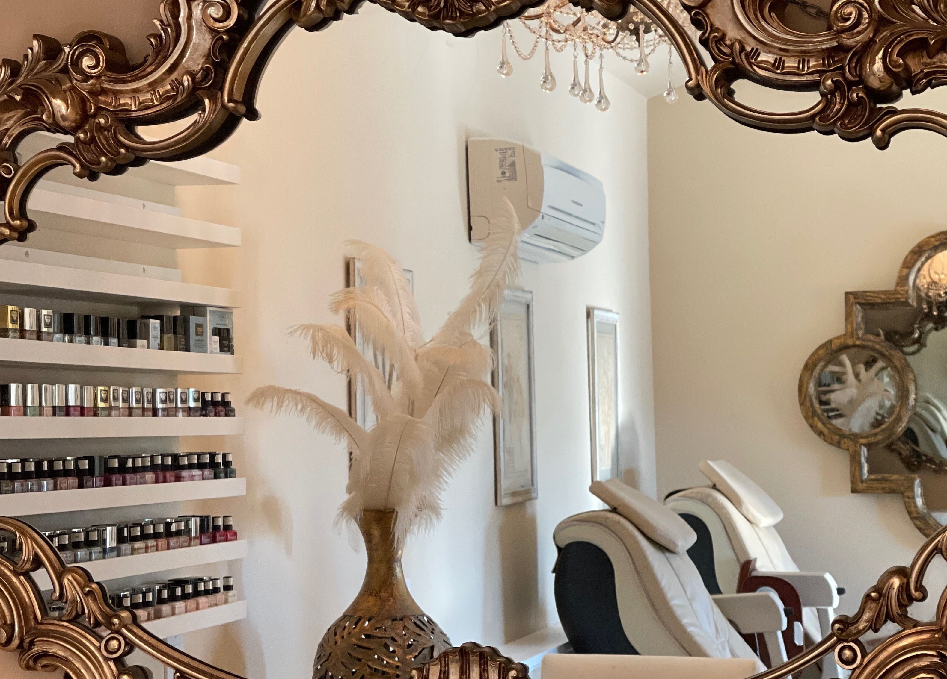 Elegant mirror at Opal Spa and Boutique in Santa Cruz, California, US, reflecting luxurious spa ambiance.