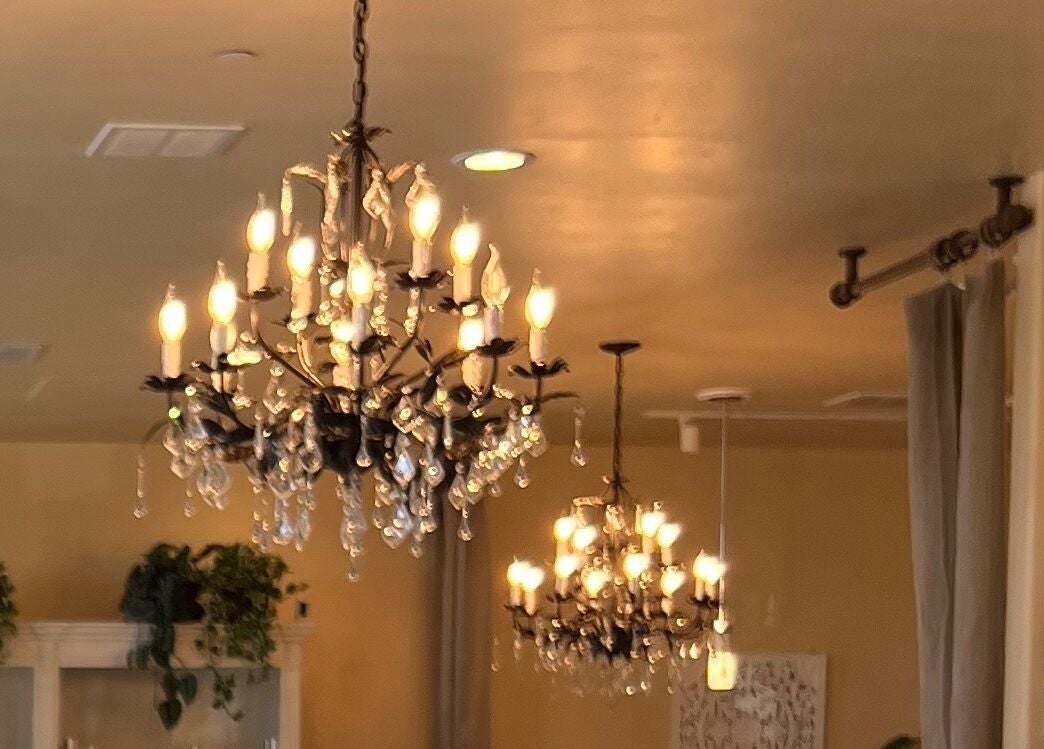 Luxurious chandeliers illuminate Opal Spa and Boutique in Santa Cruz, California, US with a warm, inviting glow.